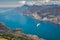 Paragliding above idyllic Lake Garda from Monte Baldo, Malcesine, Italy