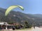 Paragliding against the backdrop of the mountains and the sea. Parachuting - paragliding. Skydiving on the background of the sky.