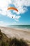 Paragliding on the deserted beach
