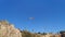 Paragliding flight over a rock in Antalya, Turkey - view from below. Video 6 seconds