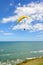 Paragliding flight over the sea