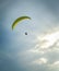 Paragliding free flying in the blue sky