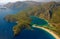 Paragliding over blue lagoon