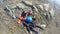 Paragliding over rocky mountain