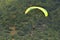 Paragliding. Paragliders together flying on a mountain background