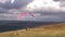 Paragliding pilot on high landscape waiting take off