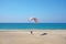 Paragliding starting on the beach