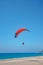 Paragliding starting on the beach