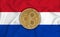 Paraguai flag, ripple gold coin on flag background. The concept of blockchain, bitcoin, currency decentralization in the country.