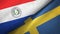 Paraguay and Sweden two flags textile cloth, fabric texture