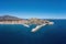 Paralio Astros port, Arcadia, Peloponnese Greece. Aerial drone panoramic view of town, moored boat
