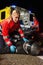 Paramedic assisting motorbike driver at night