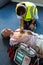 Paramedic examining a patient during cardiopulmonary resuscitation