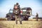 Paramedic of the German army with an emergency backpack stands at a military ambulance