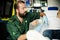 Paramedic giving a first aid to a young boy in an ambulance