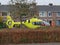 Paramedic helicopter landed on small grass field for medical emergency incident in Nieuwerkerk aan den IJssel