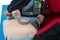 Paramedic practicing resuscitation on dummy