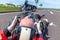 Paramedic removes an helmet from an injured biker