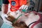 Paramedic using oxygen mask