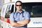 Paramedic Worker In Front Of Ambulance