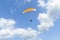 Paramotor on blue sky