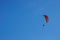 Paramotor Extreme sport flying on blue sky