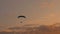 Paramotor flying on sky