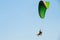 Paramotor, Parachute, Paraglide flying in the sunset sky