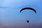 paramotor / paraglider flying into morning sky, Silhouette photo