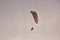 Paramotor Powered Paraglider With Red-White Parachute Flying In Sky, Extreme Sport