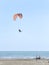 Paramotor or Powered Paragliding flying on the beach and sea