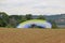 Paramotor trike launching in a field