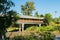 Paranhana river and a view of the covered bridge - a historical landmark in Tres Coroas, Brazil