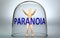 Paranoia can separate a person from the world and lock in an invisible isolation that limits and restrains - pictured as a human