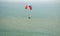 Paraplane flight over the sea