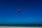 Parasailing in a blue sky in Cancun, Mexico