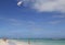 Parasailing in a blue sky over Bavaro Beach in Punta Cana, Dominican Republic