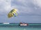 Parasailing in a blue sky in Punta Cana, Dominican Republic