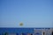 Parasailing in the Mediterranean. Parasailing is a recreational kiting activity where a person is towed behind a vehicle. Rhodes