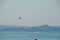 Parasailing is a popular sport in many resorts around the world. The active form of relaxation. Tourists flying on a