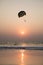 Parasailing silhouette at sunset