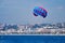 parasailing, sky, daytime, sea, parachute, water, windsports