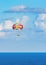 Parasailing towed behind a boat in the Caribbean sea, tropical Ocean, Vacation Concept, Cancun, Mexico