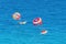 Parasailing towed behind a boat in the Caribbean sea, tropical Ocean, Vacation Concept, Cancun, Mexico