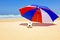 Parasol with ball at the beach