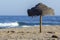 Parasol in beach and Atlantic ocean view from Tavira island