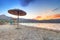 Parasol at Mirabello Bay at sunset