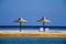 Parasols on a beach in the morning