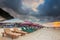 Parasols on empty beach at Sunrise in Bali