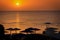 Parasols by the Red Sea at sunrise, Egypt